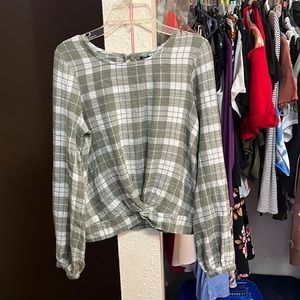 Green plaid shirt with tie in the front